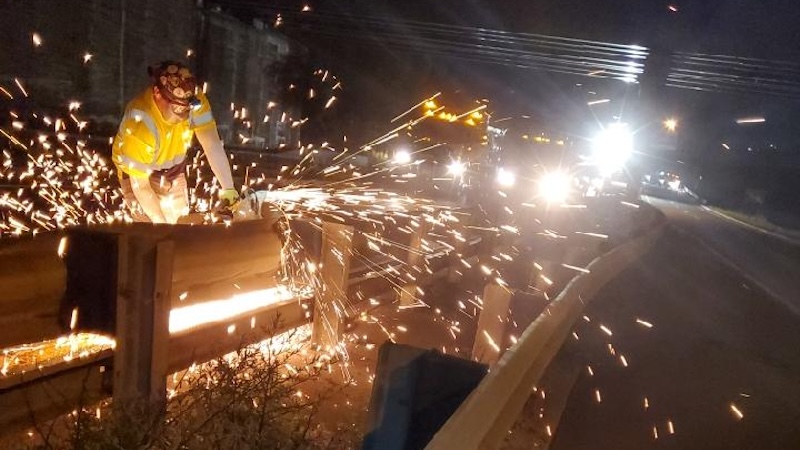 J Fletcher employee doing emergency and maintenance work at night